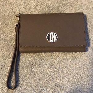 Brown DKNY wristlet
